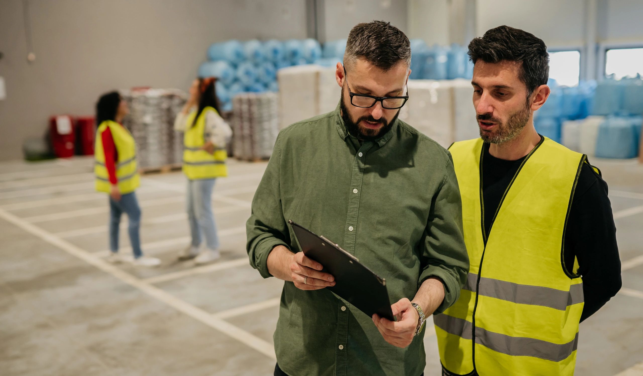 Warehouse workers in a logistics facility