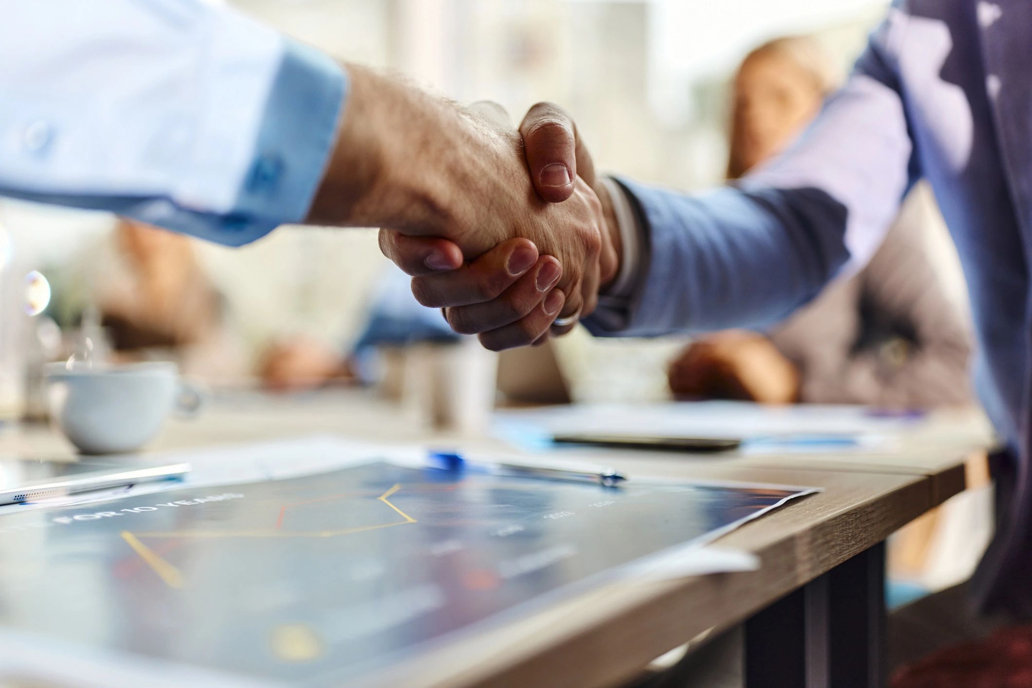 Entrepreneurs shaking hands during a meeting