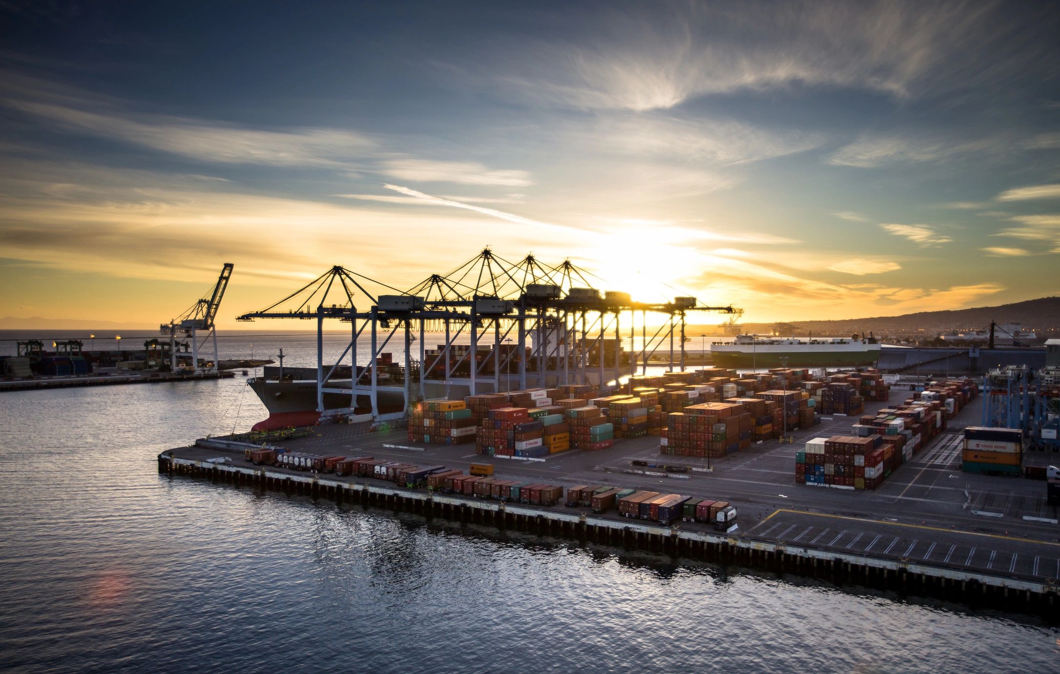 Shipping containers stacked at a port terminal